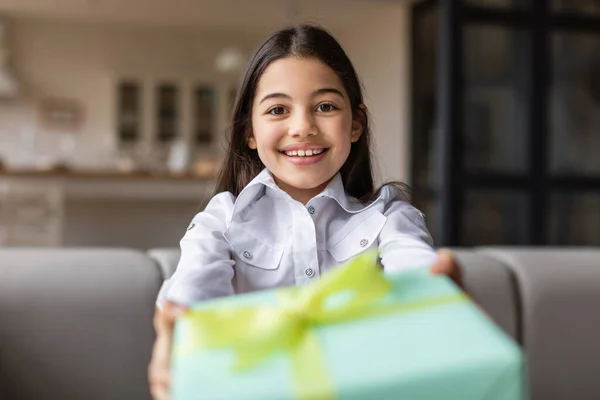 Gift You Happy Arabic Preteen Girl Giving Present Camera Sitting — Stock Photo, Image