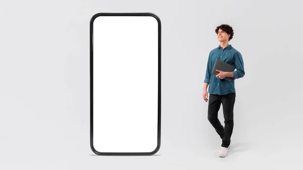 Young Man Laptop Posing Large Mobile Phone Blank Screen Advertising — 스톡 사진