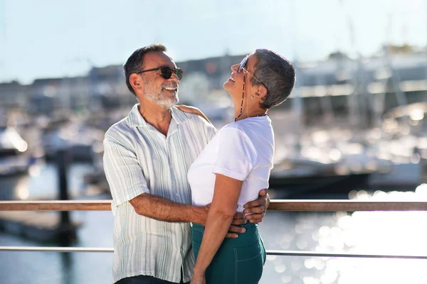 Summer Retirement Positive Senior Couple Hugging Laughing Yachts Marina Pier — Stock Photo, Image