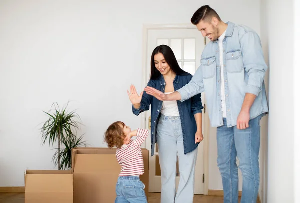 Happy Parents Giving Hight Five Adorable Son Moving Day Loving — Stok Foto