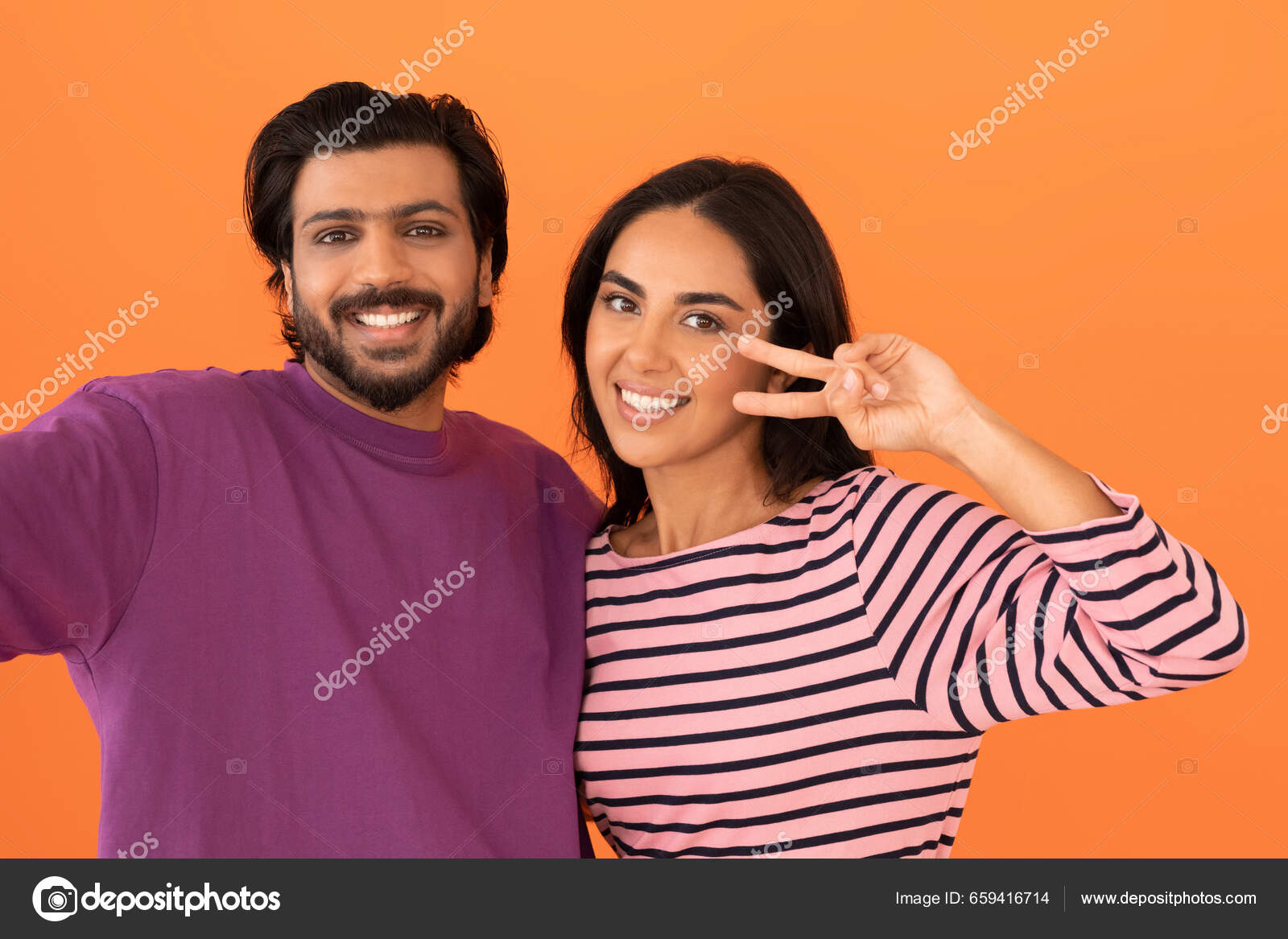 Portrait Of Young Couple In Love Posing At Studio - Stock Image - Everypixel