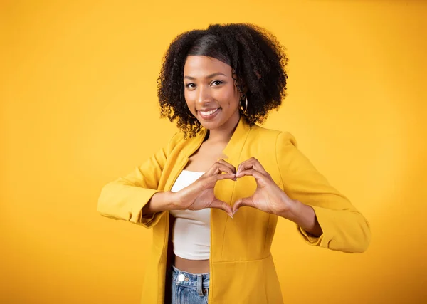 Cheerful Young Black Lady Bushy Curly Hair Showing Heart Hand — Stock Photo, Image