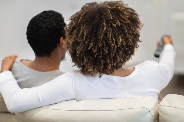 Rear View Black Couple Sitting Couch Embracing Watching Home African — Stock Photo, Image