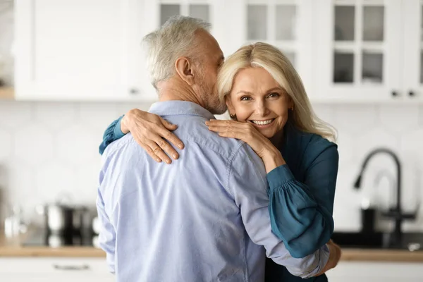 Portrait Loving Senior Couple Embracing Kitchen Interior Romantic Mature Spouses — Stock Photo, Image