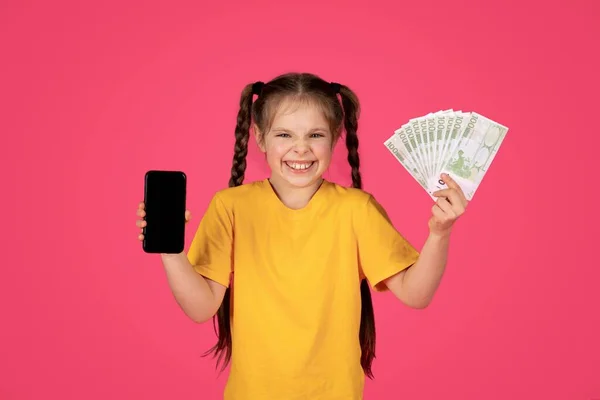 Surprised Little Girl Holding Smartphone Blank Screen Euro Cash Money — Stock Photo, Image
