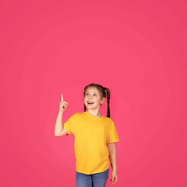 Look Excited Female Child Pointing Finger Showing Copy Space Preteen — Stock Photo, Image