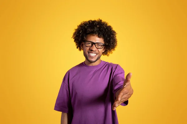 Happy Black Adult Curly Guy Violet Shirt Glasses Makes Greeting — Stock Photo, Image