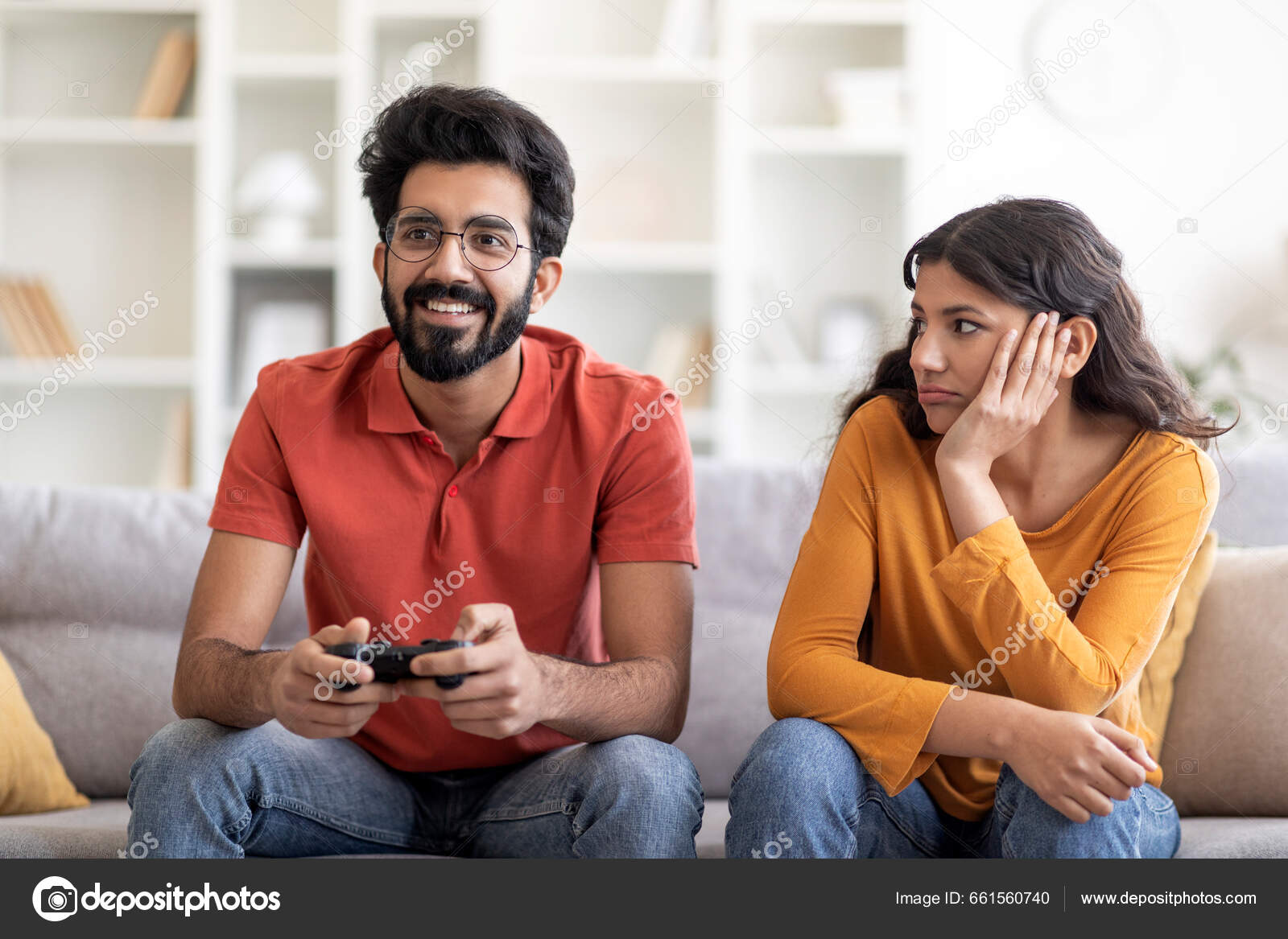 Bored Young Indian Woman Looking Boyfriend Playing Video Games