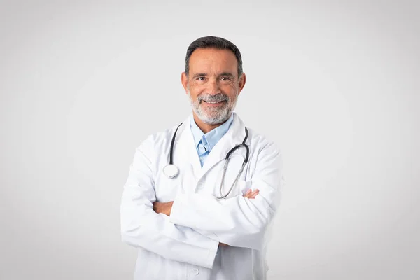 Cheerful Confident Caucasian Mature Man Doctor White Coat Crossed Arms — Stock Photo, Image