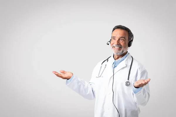 Happy Caucasian Mature Man Doctor Therapist White Coat Headphones Spreads — Stock Photo, Image