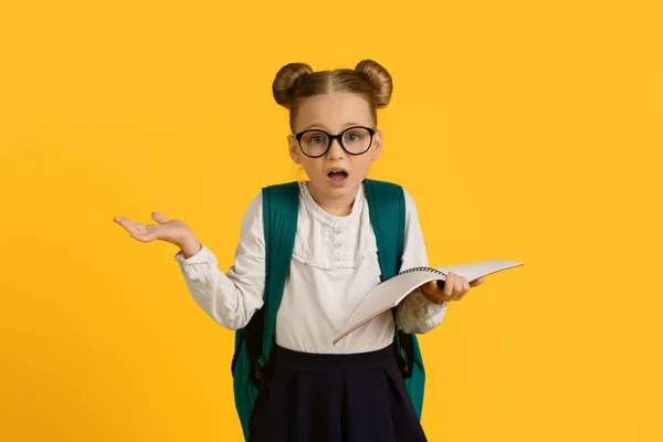 Too Much Homework Confused Little Schoolgirl Eyeglasses Holding Workbook Looking — Stock Photo, Image