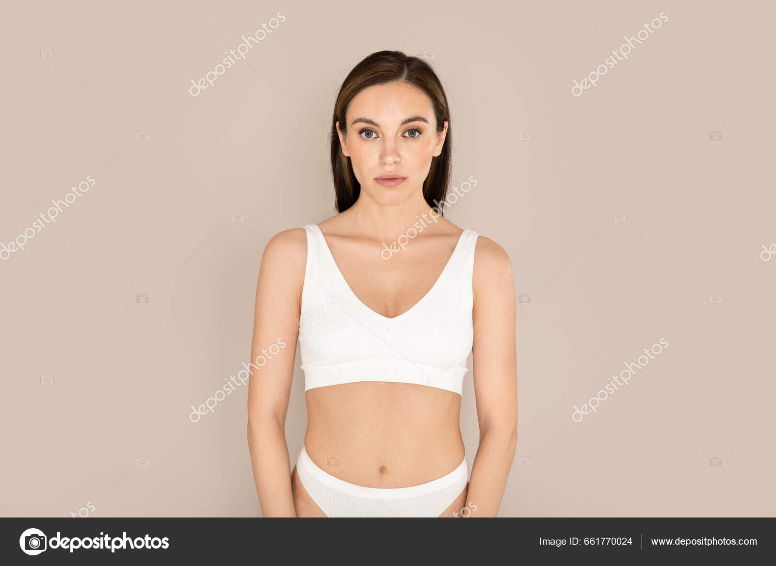 Foto de Women wearing a white tank top And nude color lingerie do
