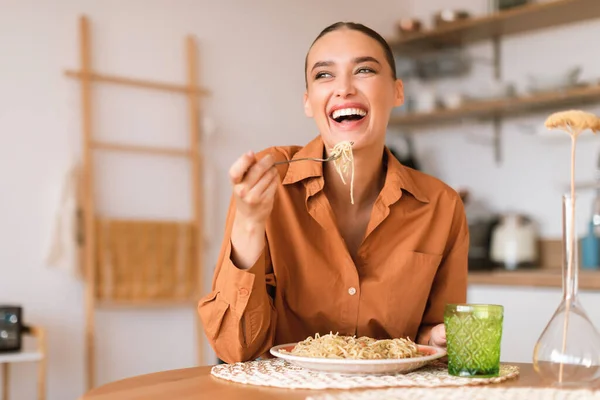 Kitchen Happenings Excited Woman Eating Tasty Homemade Pasta Enjoying Delicious — Stock Photo, Image