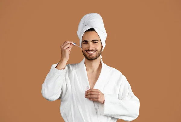Facial Skincare Middle Eastern Guy Applying Facial Serum Dropper Moisturizing — Stock Photo, Image