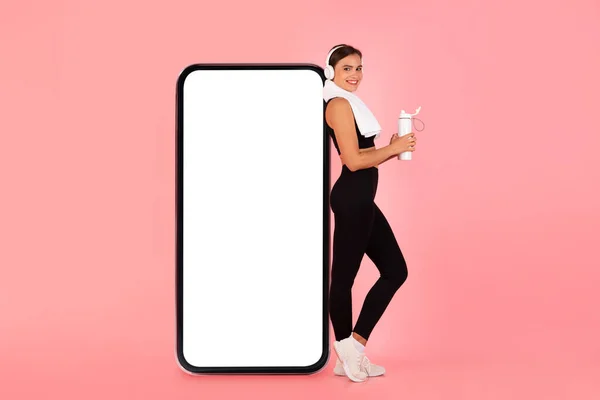 Fitness Offer Sporty Young Woman Posing Big Blank Smartphone White — Stock Photo, Image