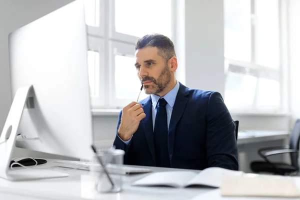 Thoughtful Middle Aged Businessman Working Computer Sitting Office Male Entrepreneur — Stock Photo, Image