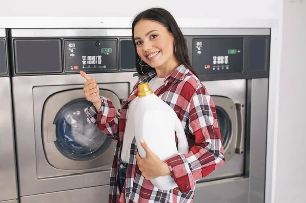 Public Laundry Happy Lady Detergent Bottle Gesturing Thumb Posing Industrial — Stock Photo, Image