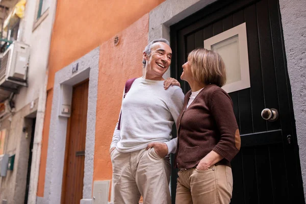 Positive Senior Tourists Spouses Standing Street Lisbon Hugging Smiling Each — Stock Photo, Image