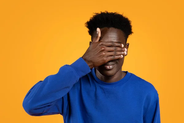 Young Black Man Wearing Blue Sweater Covering His Eyes Palm — Stock Photo, Image