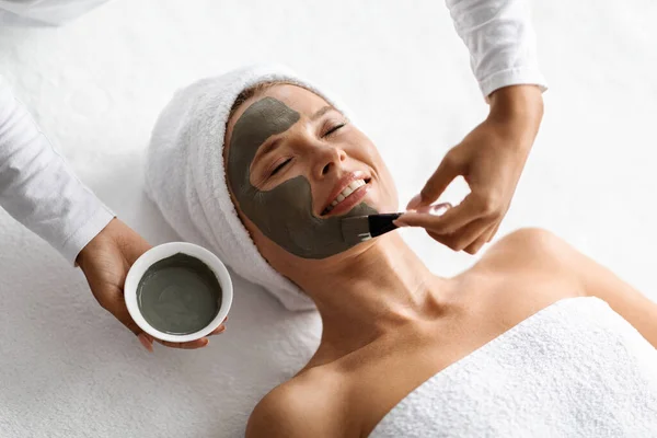 Aesthetic Procedure Beautician Applying Clay Face Mask Middle Aged Woman — Stock Photo, Image