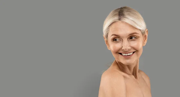 Beauty Smiling Mature Woman Looking Copy Space Grey Studio Background — Stok Foto