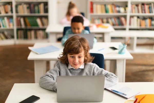 Positive School Children Sitting Desks Classroom Typing Laptops Studying Using — Stock Photo, Image