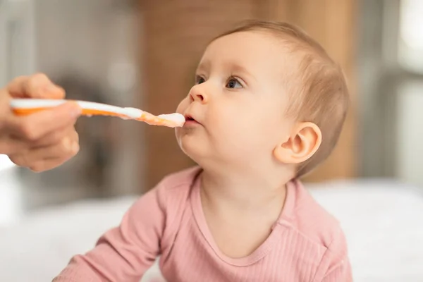 Childcare Concept Mother Feeding Her Adorable Infant Baby Girl Spoon — Stock Photo, Image