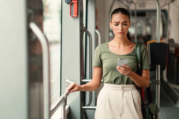 City Commuting Issue Unhappy Lady Passenger Using Cellphone Texting Standing — Stock Photo, Image