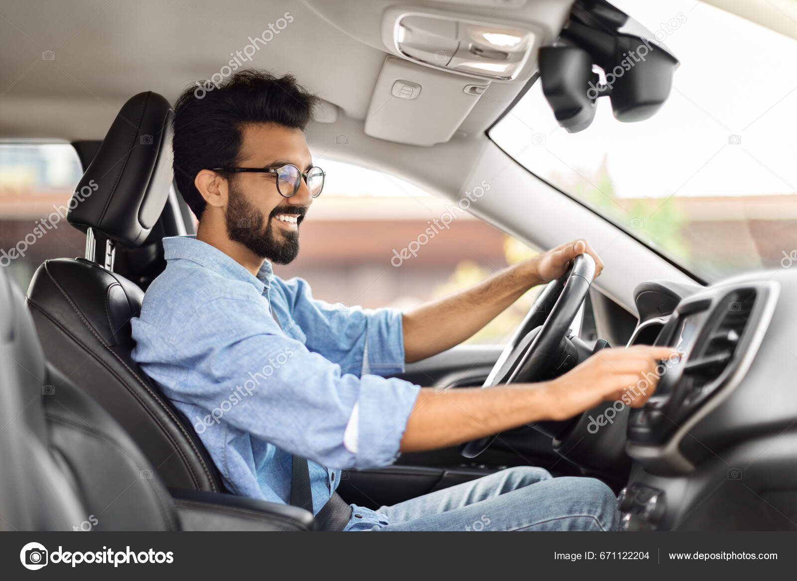 Road Playlist Side View Happy Young Indian Man Driving Car Stock Photo by  ©Milkos 671122204