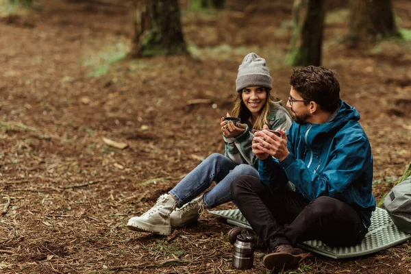 Cheerful Young Caucasian Couple Jackets Forest Drinking Cups Tea Thermos — Stock Photo, Image