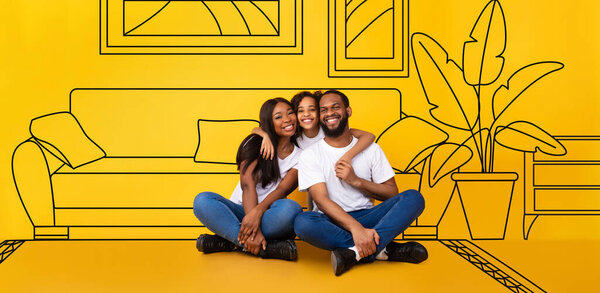 Smiling little black girl hug millennial family, sit on floor, isolated on yellow studio background, with abstract drawn living room furniture interior. Dreams of house, renovation, buy real estate