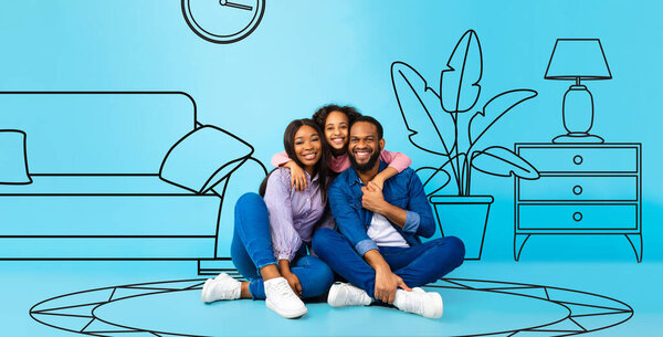 Cheerful adult african american family hugs with little girl on floor, enjoy house on blue studio background, with abstract drawn furniture in living room interior, panorama. Buy own home, credit