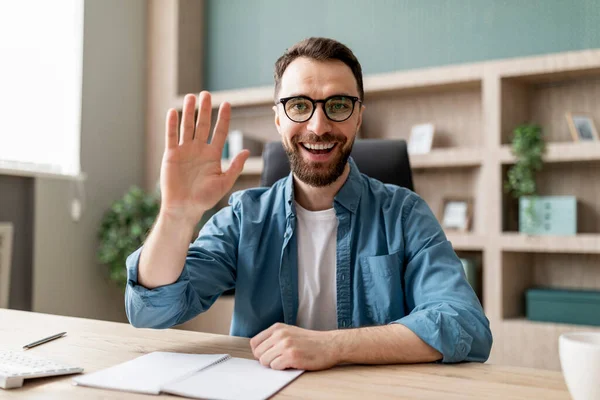 Greeting Concept Happy Young Businessman Eyeglasses Waving Hand Camera While — Stock Photo, Image