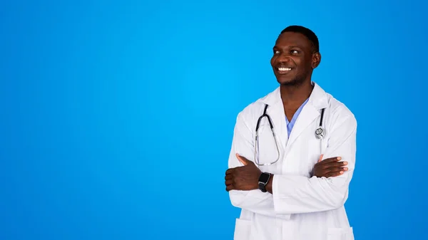 Cheerful Young Black Doctor White Coat Crossed Arms Chest Looks — Stock Photo, Image