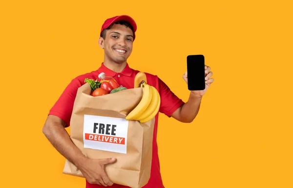 Mexican Courier Guy Phone Advertising Free Grocery Delivery Showing Smartphone — Stock Photo, Image