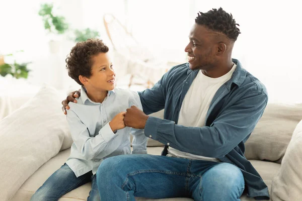 African American Daddy His Kid Boy Bumping Fists Celebrating Achievement — Stock Photo, Image