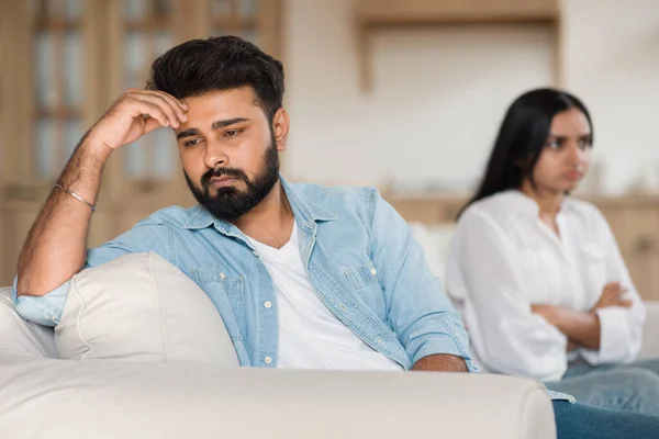 Family Problems Unhappy Indian Man Sitting Separate Discontented Wife Sofa — Stock Photo, Image