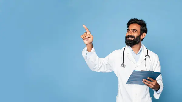 Professional Indian Man Doctor White Coat Stethoscope Pointing Finger Blank — Stock Photo, Image