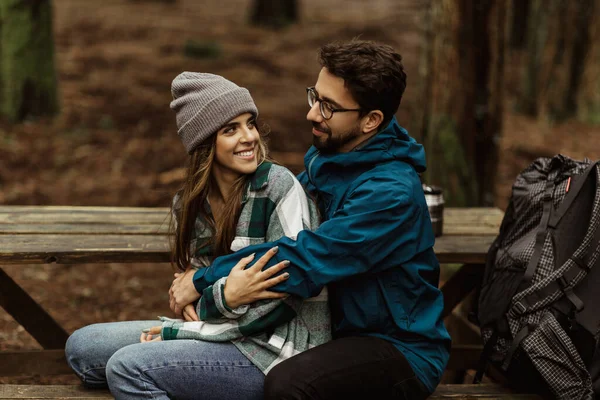 Positive Young Caucasian Family Jackets Sit Bench Hugging Enjoy Date — Stock Photo, Image