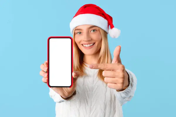 Happy Caucasian Lady Santa Hat Pointing Smartphone White Empty Screen — Stock Photo, Image