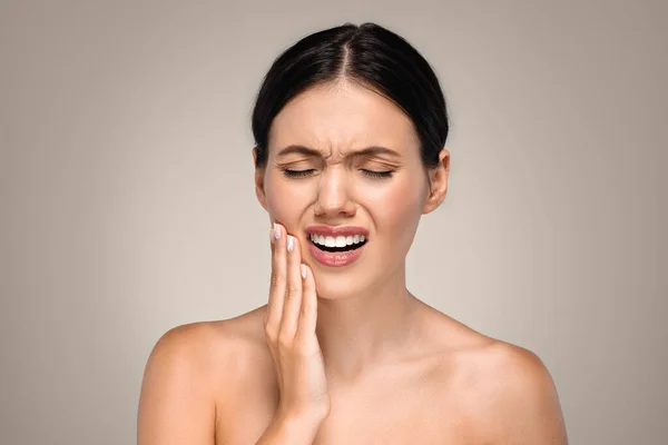 Unhappy Despaired Millennial Caucasian Woman Puts Hand Cheek Suffering Toothache — Stock Photo, Image
