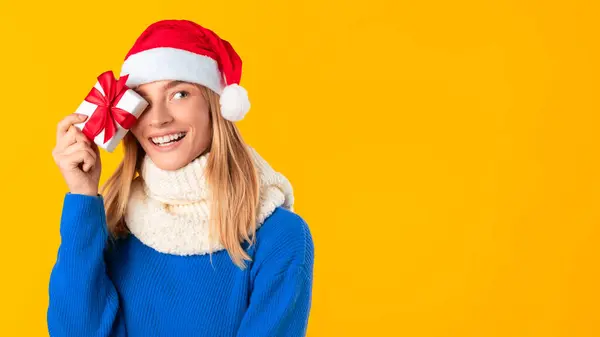 Happy Young European Lady Wearing Sweater Santa Hat Covering Eye — Stock Photo, Image