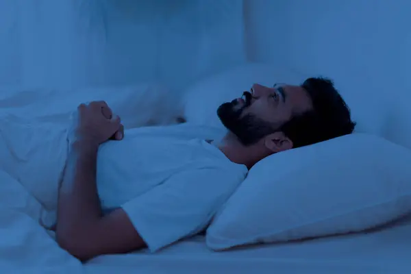 Awake Sleepless Upset Indian Man Lying Bed Alone Night Staring — Stock Photo, Image