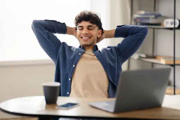 Satisfied Millennial Arabic Guy Takes Break Rests Workplace Home Office — Stock Photo, Image