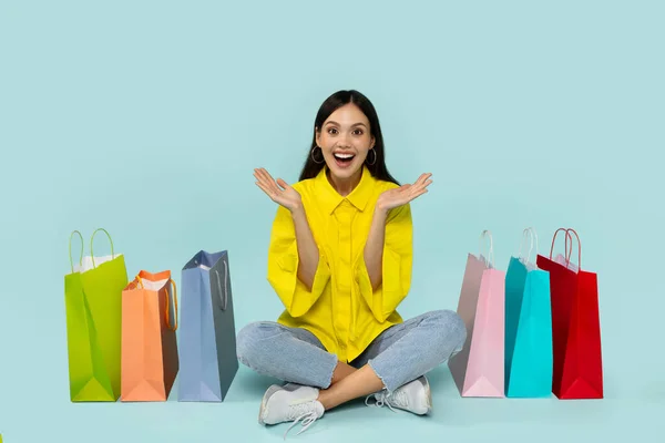 Seasonal Sales Happy Woman Sitting Floor Shopping Bags Posing Blue — Stock Photo, Image