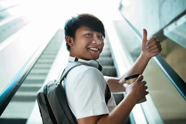 Excited Cheerful Young Asian Guy White Shirt Backpack Tourist Drinking — Stock Photo, Image
