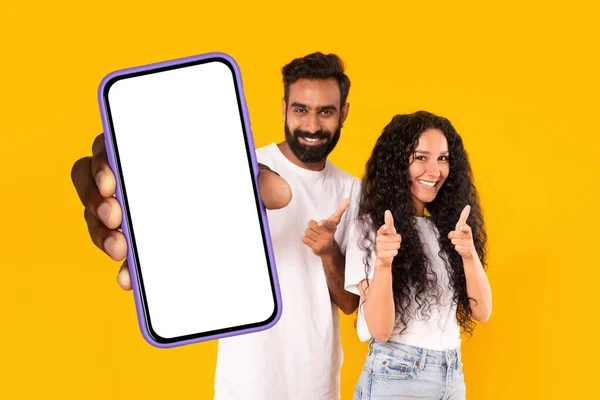 Mobile App Happy Arabic Couple Showing Huge Smartphone White Blank — Stock Photo, Image