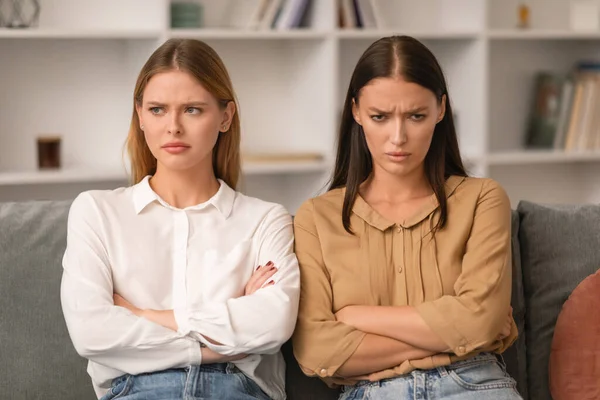Two Young Ladies Angry Each Other Conflict Sitting Sofa Home — Stock Photo, Image