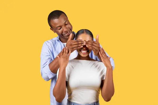 Playful Surprise Black Man Covers Womans Eyes His Hands Both — Fotografia de Stock
