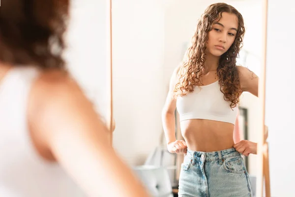 Unhappy Teen Girl Looking Critically Her Thin Waist Mirror Suffering —  Fotos de Stock